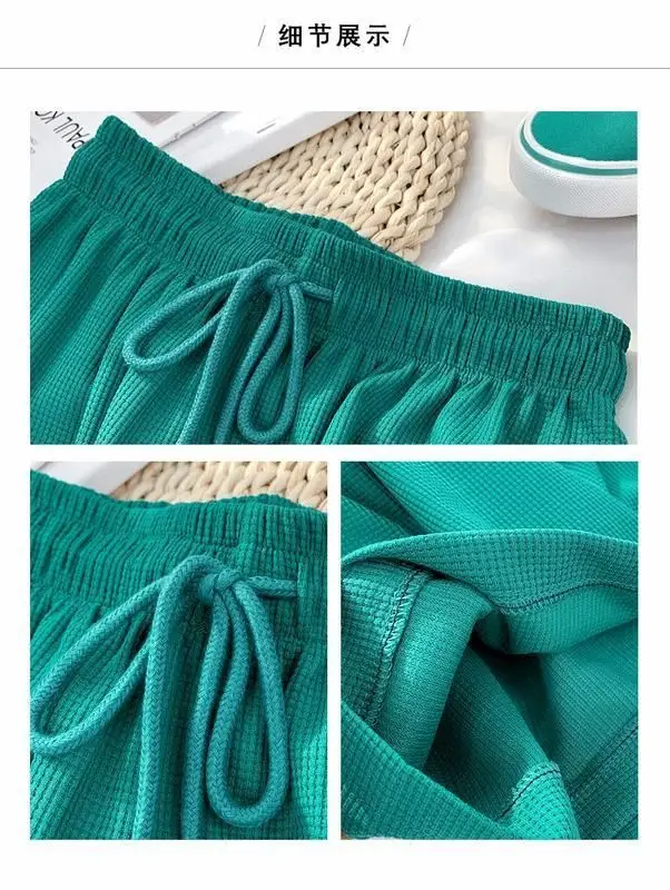 Women Black Waffle Elastic Waist Wide Leg Pants — feature 8