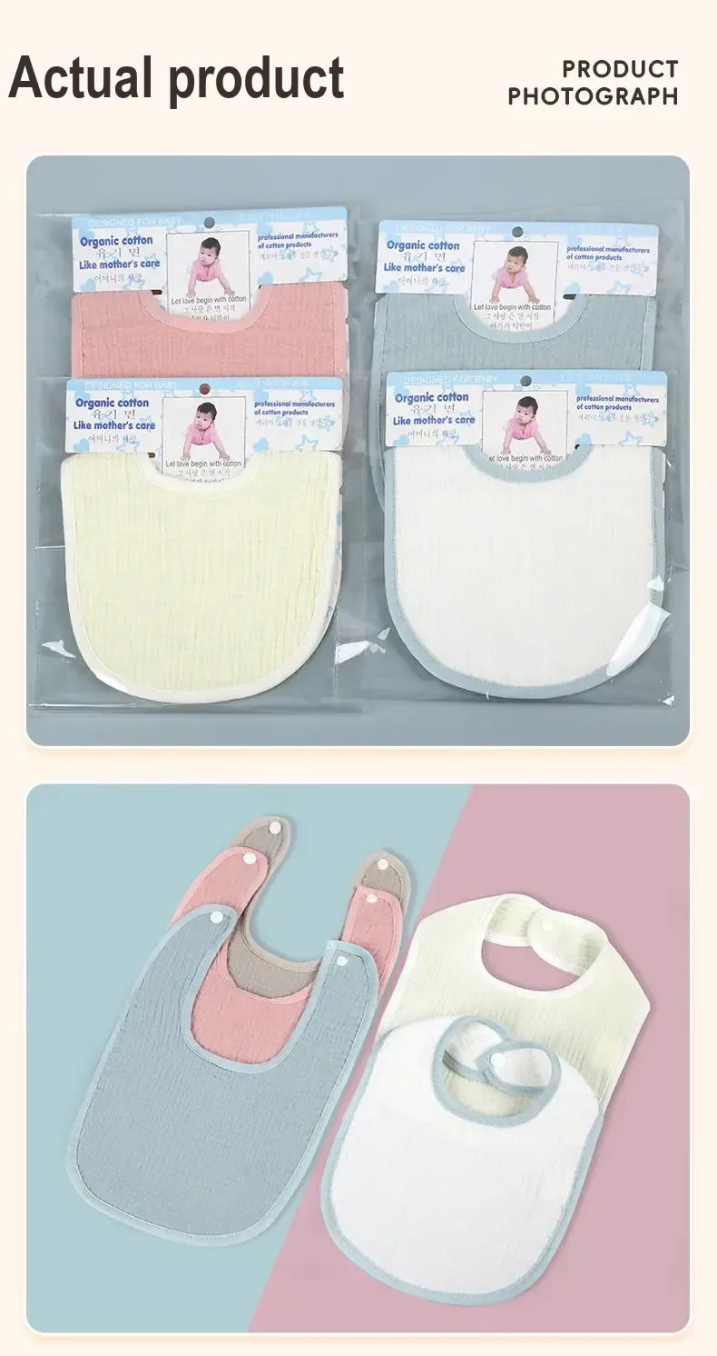 Four bibs in clear retail packaging in pink, light blue, yellow and white.