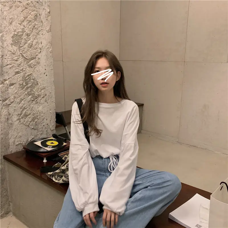 White Long Sleeve Top with High Waist Jeans for Women — feature 11