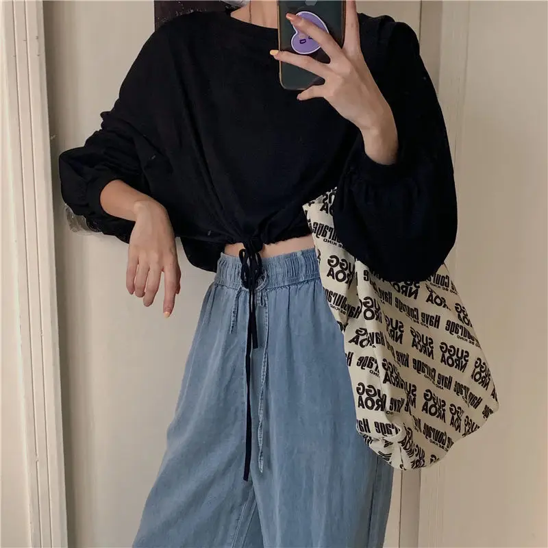White Long Sleeve Top with High Waist Jeans for Women — feature 17