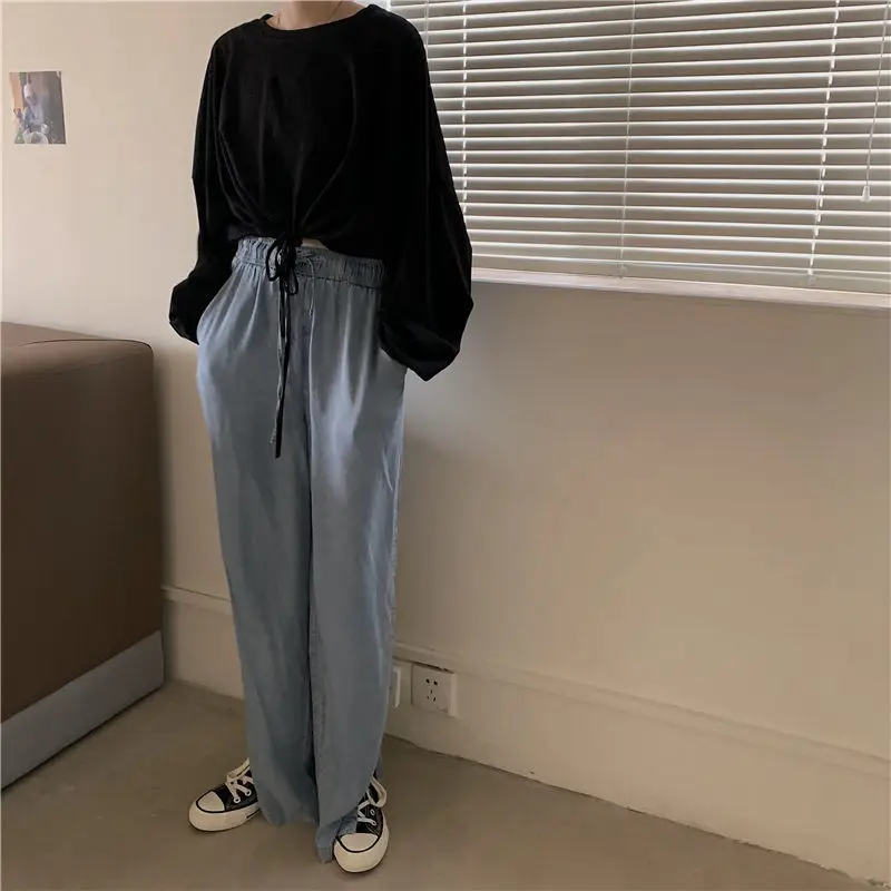 White Long Sleeve Top with High Waist Jeans for Women — feature 21