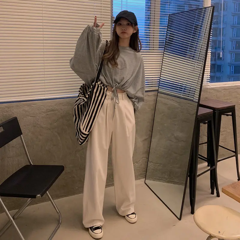 White Long Sleeve Top with High Waist Jeans for Women — feature 23