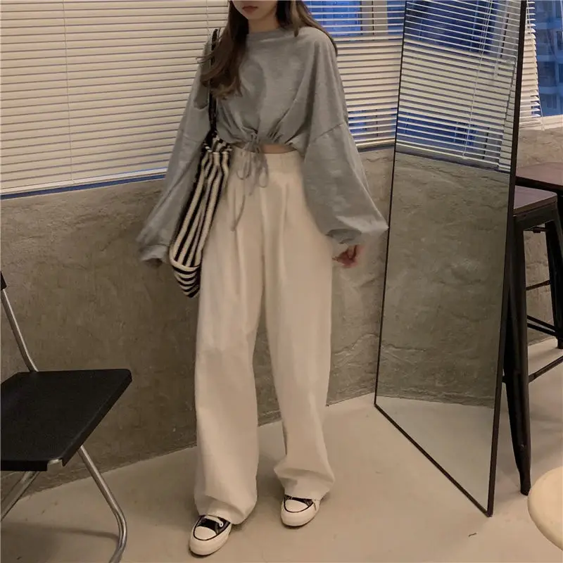 White Long Sleeve Top with High Waist Jeans for Women — feature 25