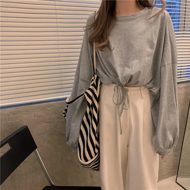 White Long Sleeve Top with High Waist Jeans for Women — feature 27