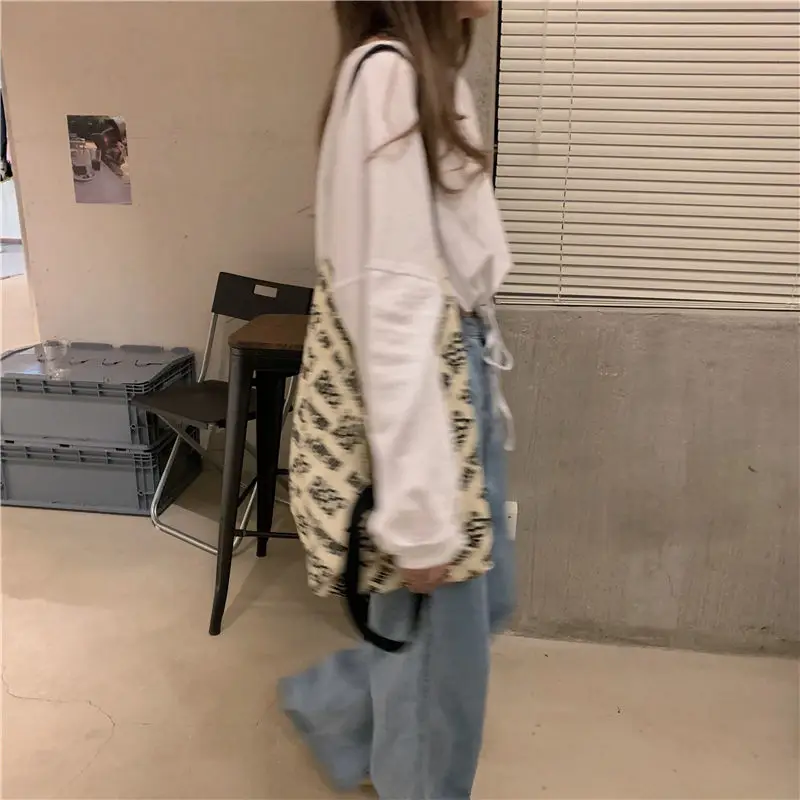 White Long Sleeve Top with High Waist Jeans for Women — feature 3