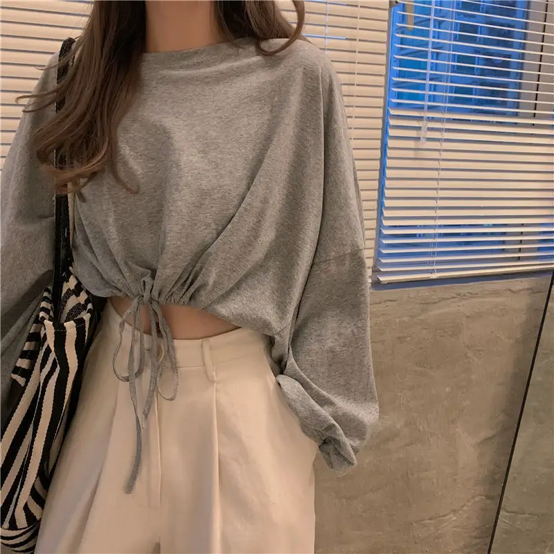 White Long Sleeve Top with High Waist Jeans for Women — feature 31