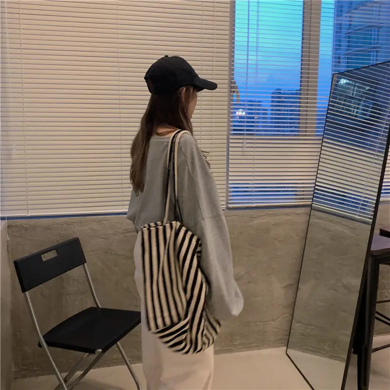White Long Sleeve Top with High Waist Jeans for Women — feature 32