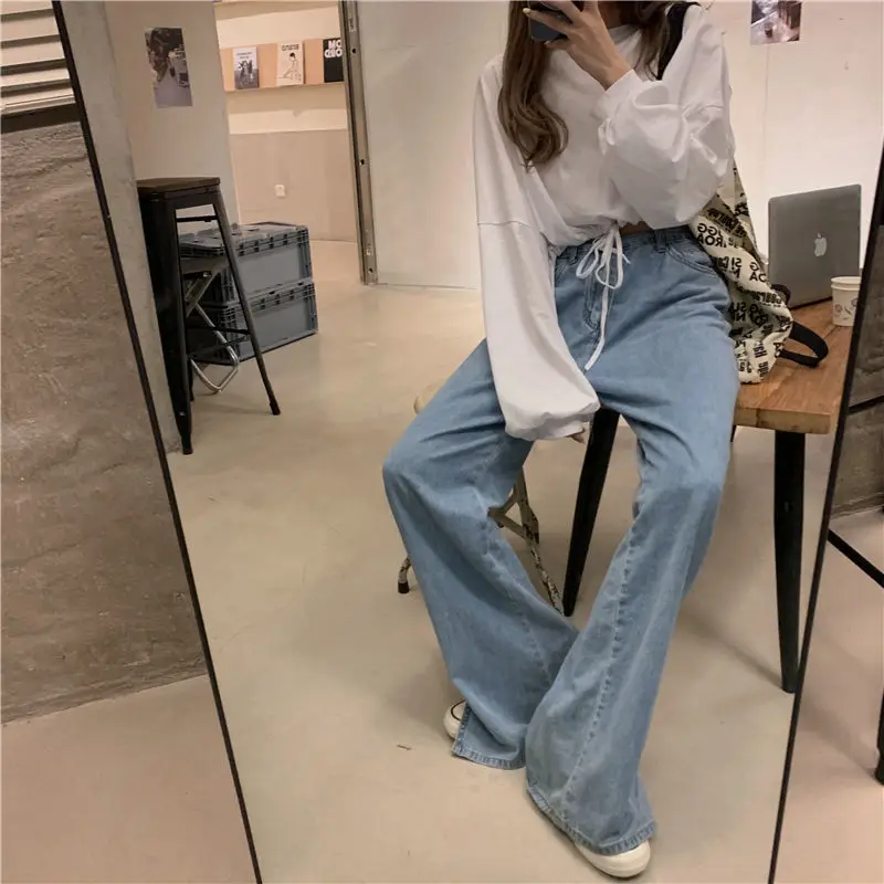 White Long Sleeve Top with High Waist Jeans for Women — feature 8