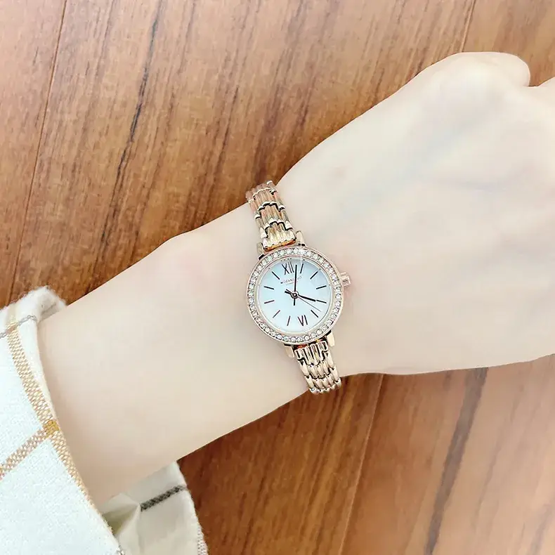 Women Roman Fritillaria Quartz Watch with Water Drop Bracelet