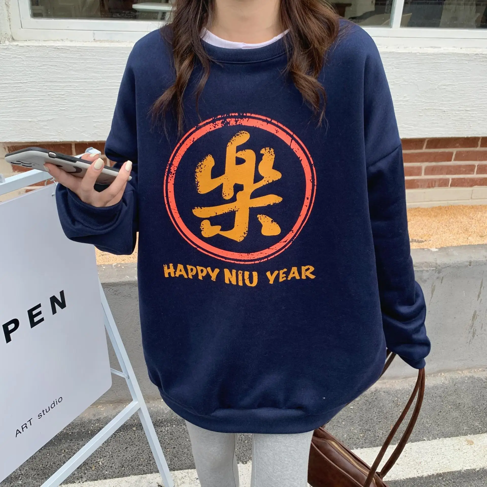 Women's Black New Year Sweatshirt with Art Print — feature 23