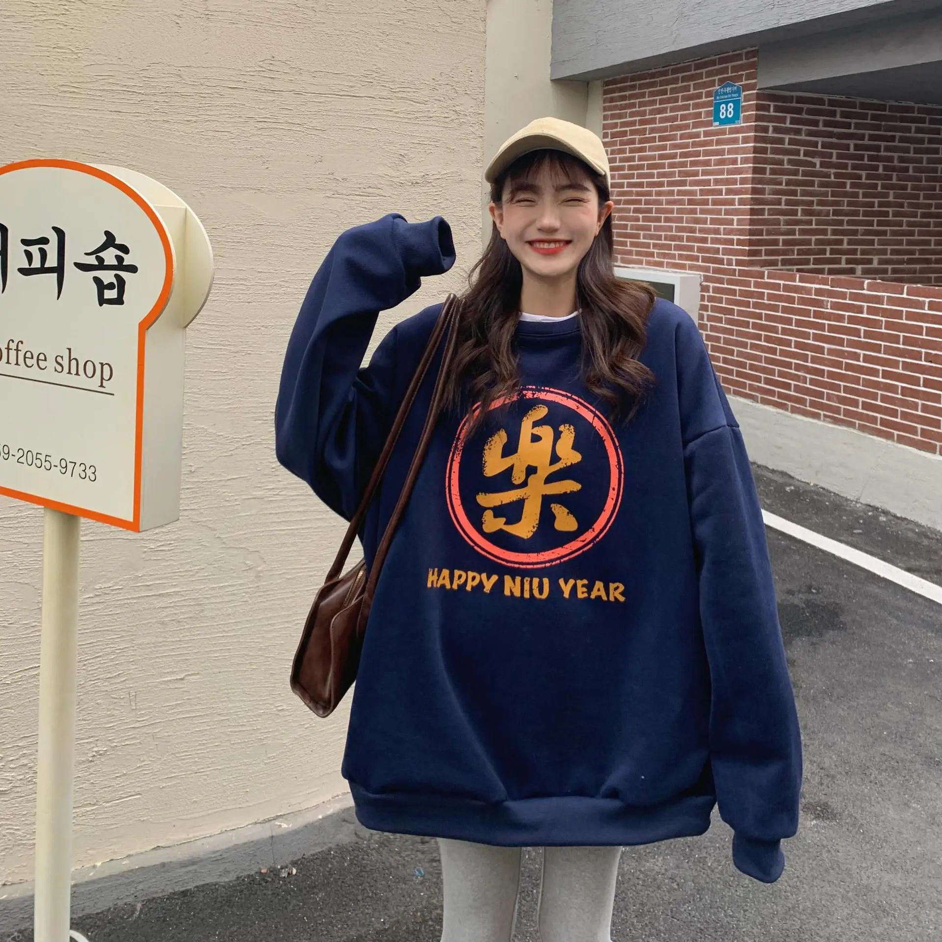 Women's Black New Year Sweatshirt with Art Print — feature 27