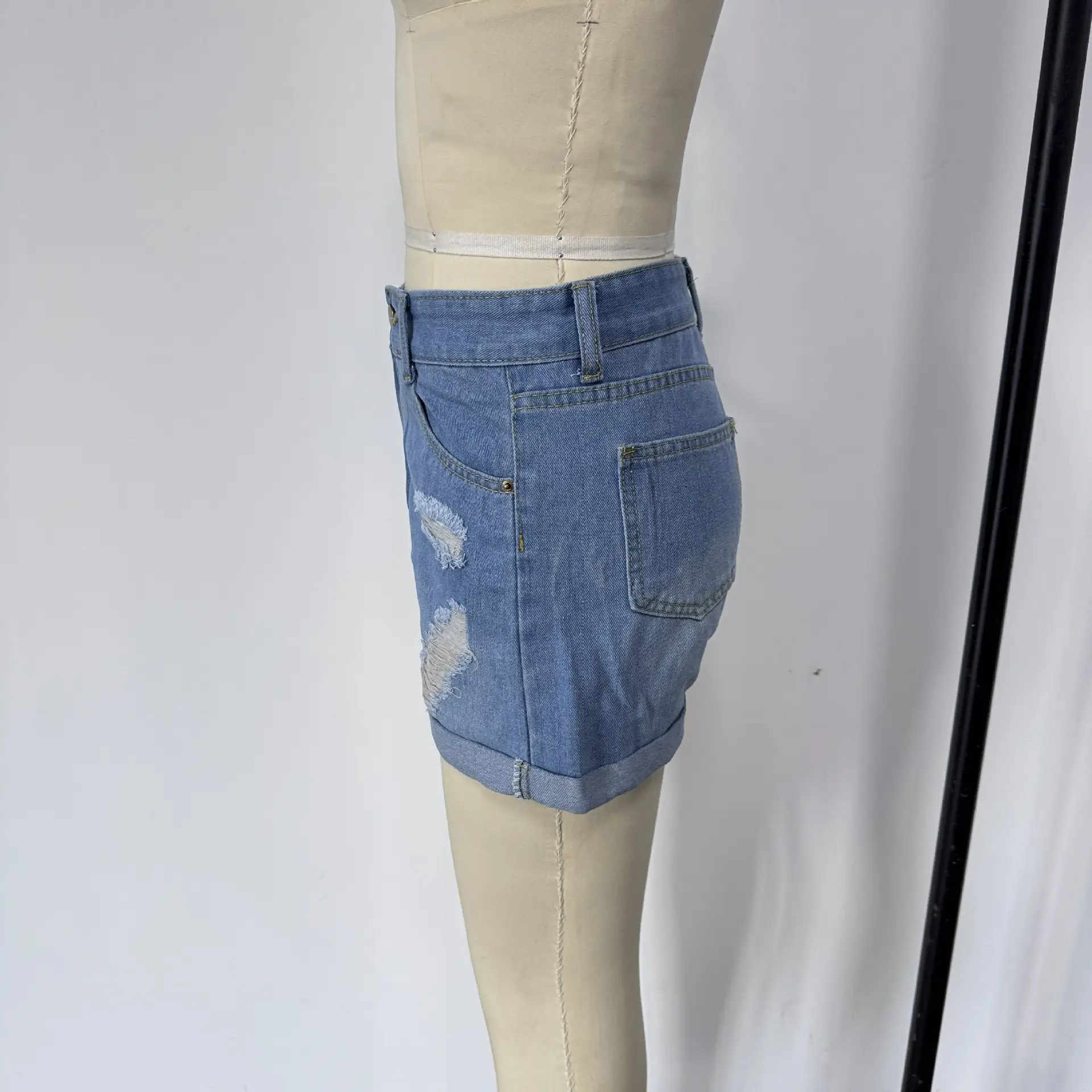 Women Denim Shorts with Cross-Country Flanged Holes — feature 3