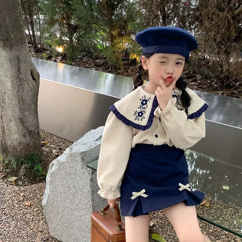 Spring new suit female baby Korean style lapel shirt + skirt two-piece set a generation of 77055