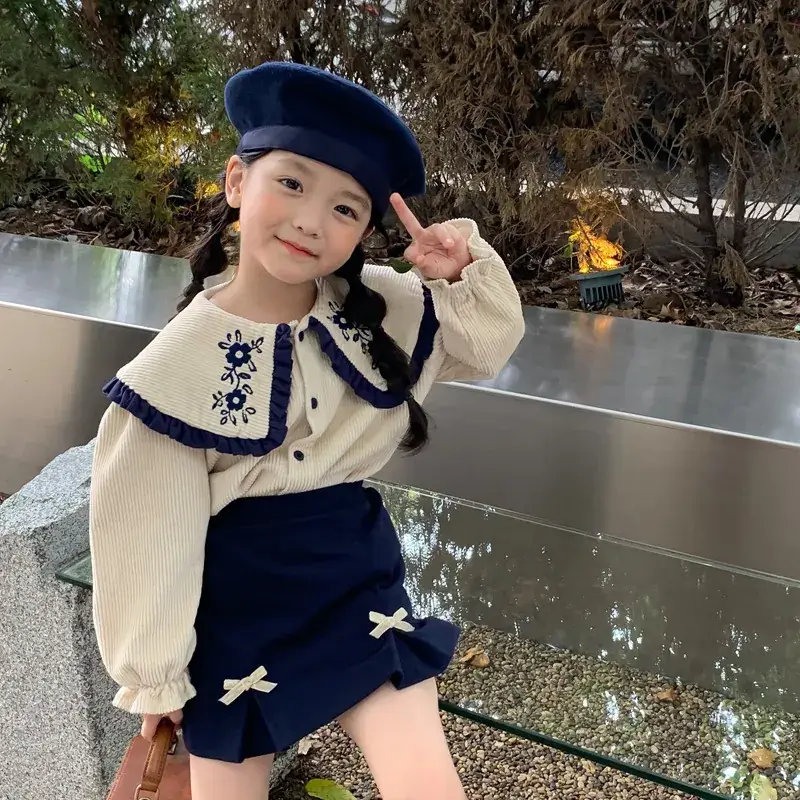 Spring new suit female baby Korean style lapel shirt + skirt two-piece set a generation of 77055