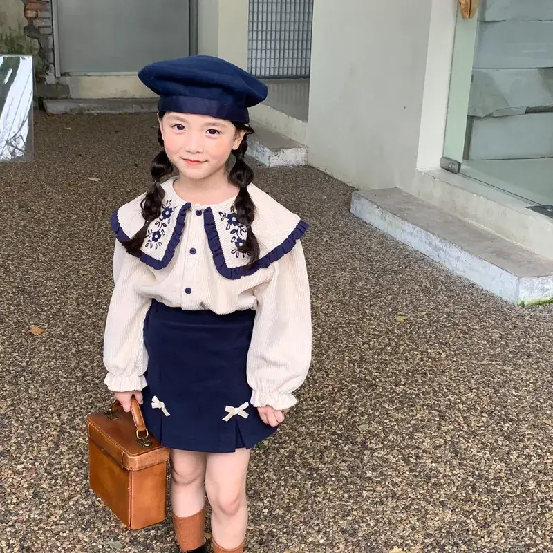 Spring new suit female baby Korean style lapel shirt + skirt two-piece set a generation of 77055