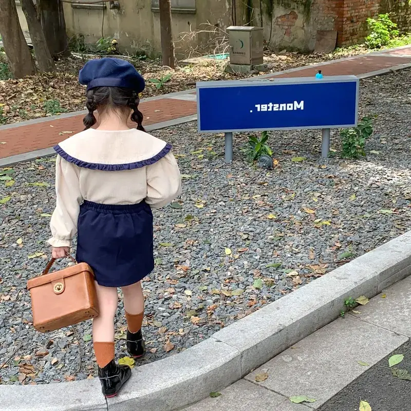 Spring new suit female baby Korean style lapel shirt + skirt two-piece set a generation of 77055
