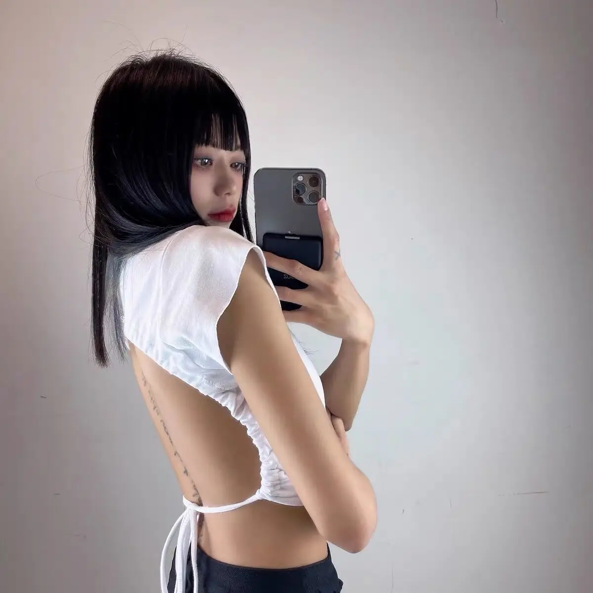 Women's Black Crop Top with Backless Design — feature 1