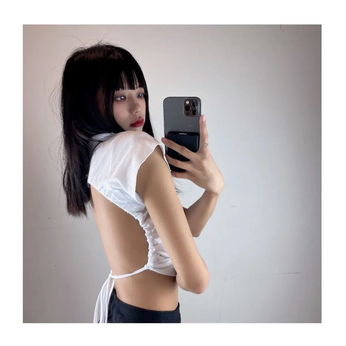 Women's Black Crop Top with Backless Design — feature 6