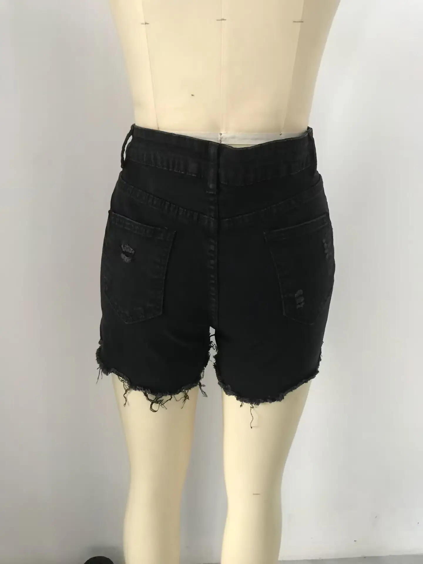 Women Denim Ripped Pocket Shorts with Star Print — feature 3