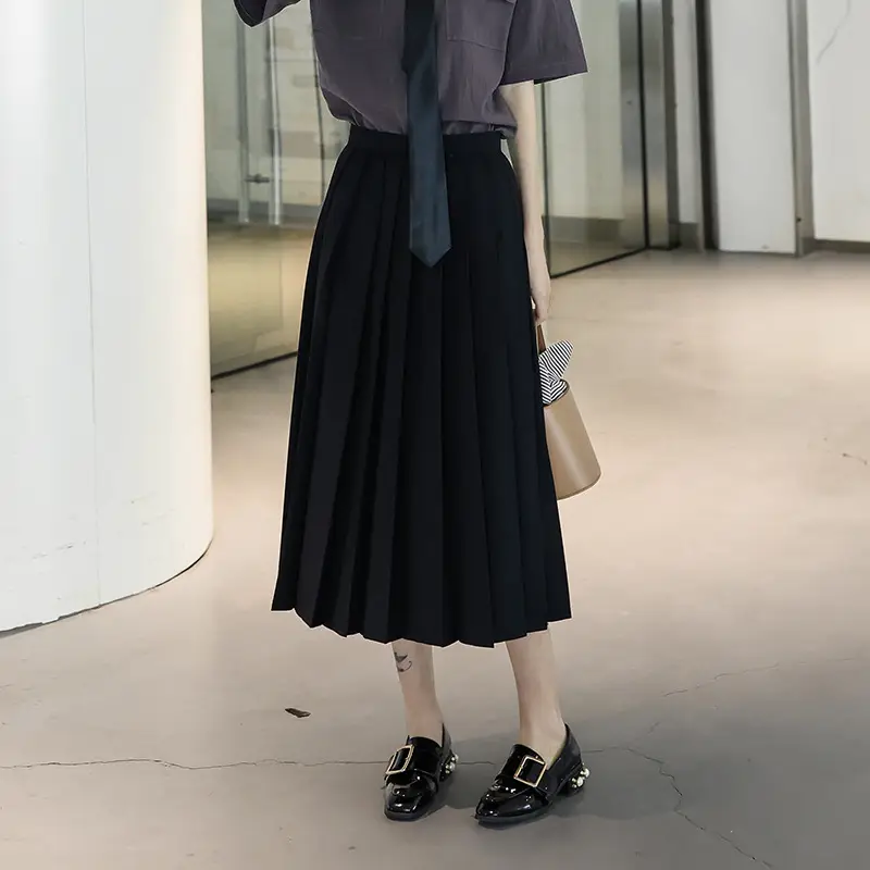 Black Pleated JK Skirt with High Heels for Women - Image 3