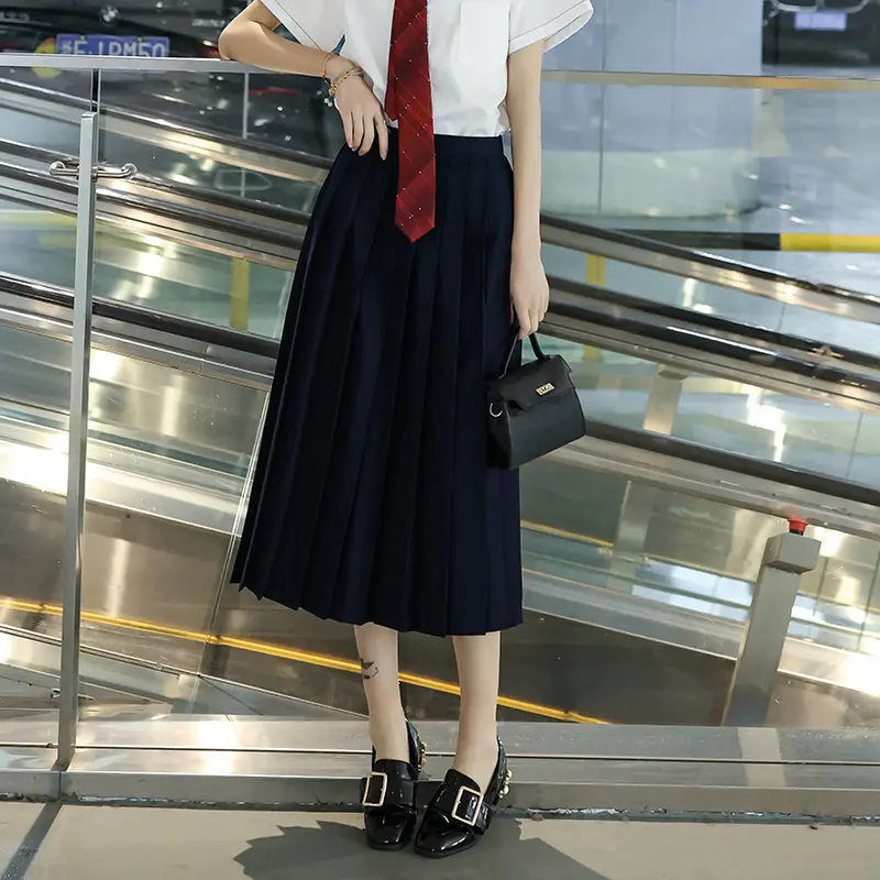 Black Pleated JK Skirt with High Heels for Women - Image 6