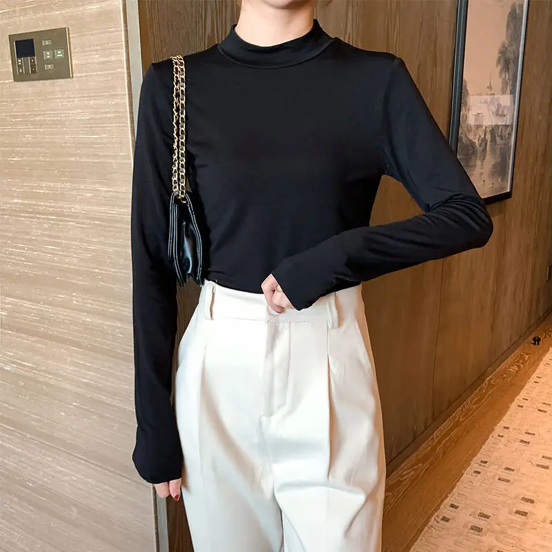 Women's Black Long Sleeve Top with White Pants Set - Image 8