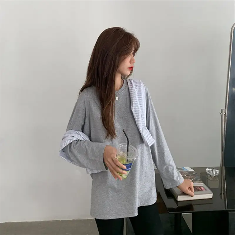 Women Long Sleeve Black Top with Light Grey Jeans - Image 7