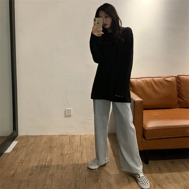 Women Long Sleeve Black Top with Light Grey Jeans — feature 14