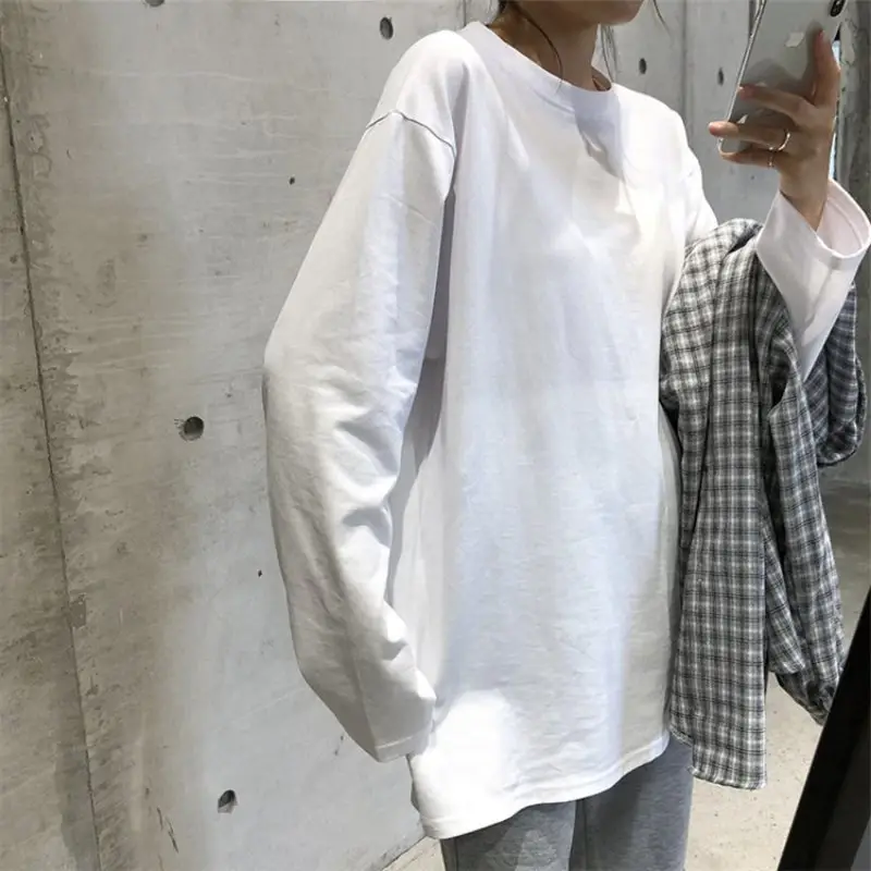 Women Long Sleeve Black Top with Light Grey Jeans — feature 16