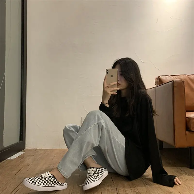 Women Long Sleeve Black Top with Light Grey Jeans — feature 20