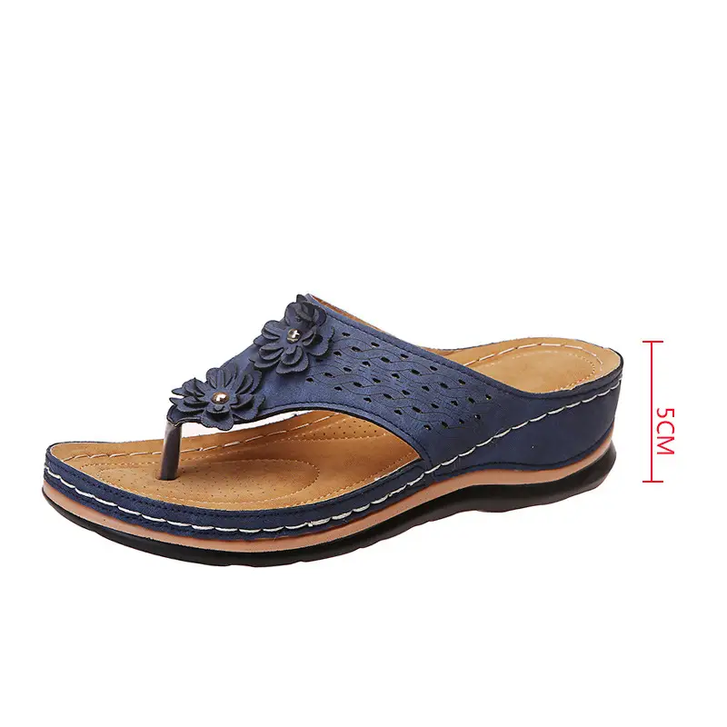 Women's Tan Leather Cross-Size Flip Flops with Flower Muffins
