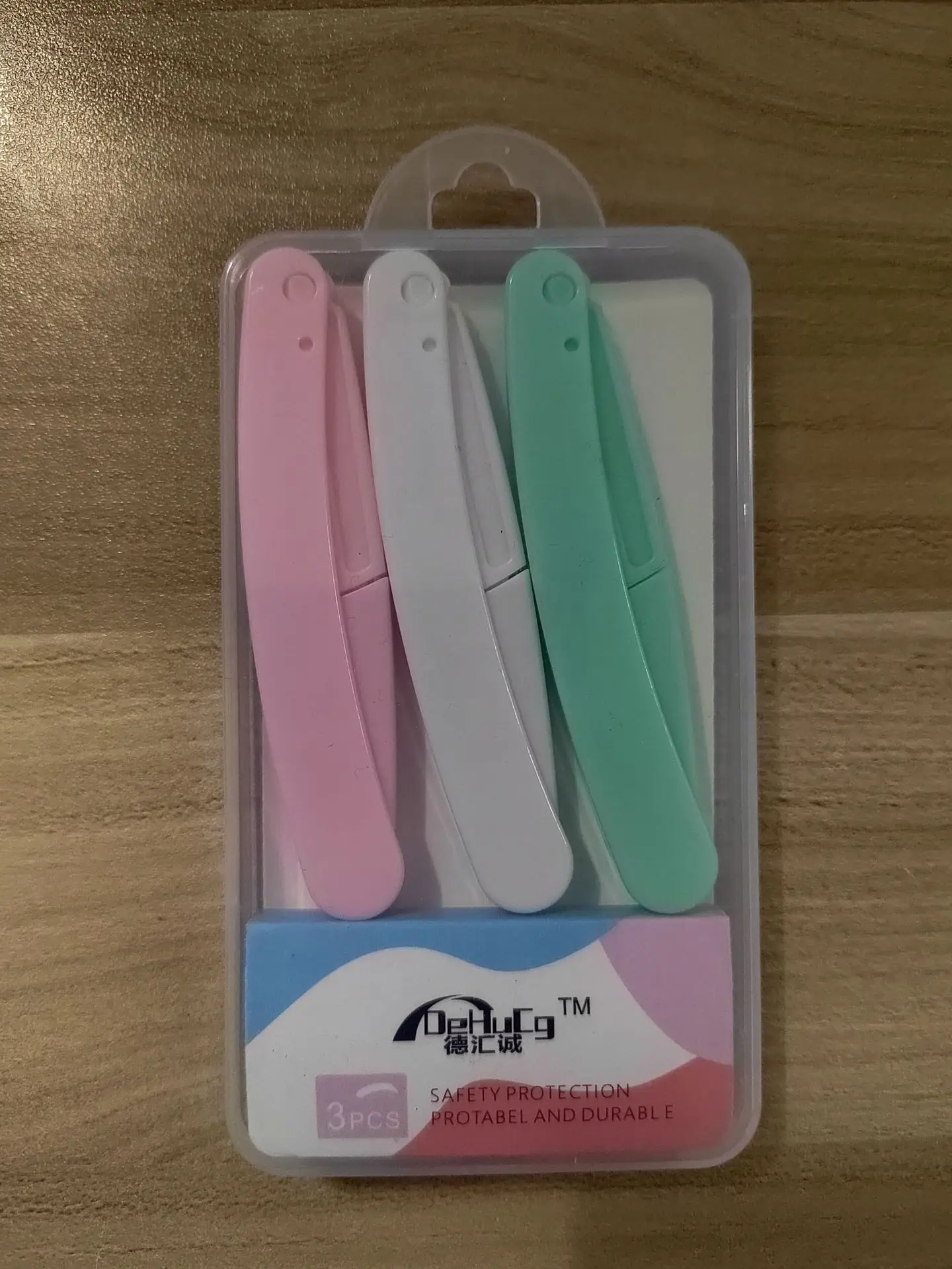Folding eyebrow razor-mixed color three-piece box