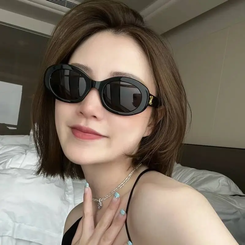 Women's Black Cat's Eye Sunglasses with Brown Tint — feature 2