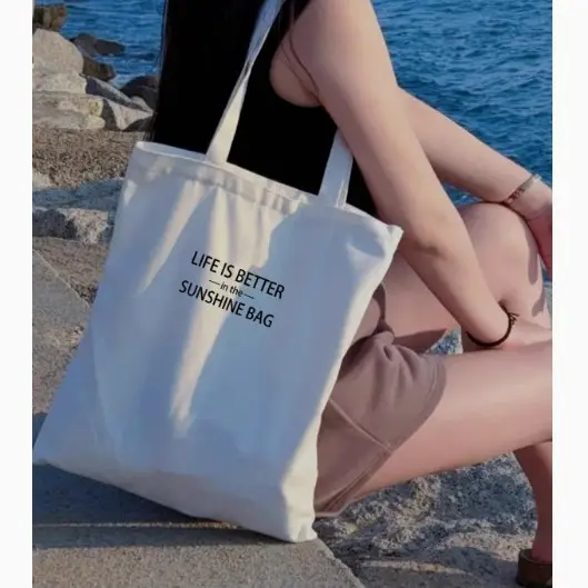 Women's Canvas Shoulder Bag with "Always Hungry" Print - Image 27