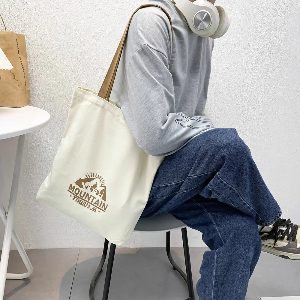 Women's Canvas Shoulder Bag with "Always Hungry" Print — feature 16