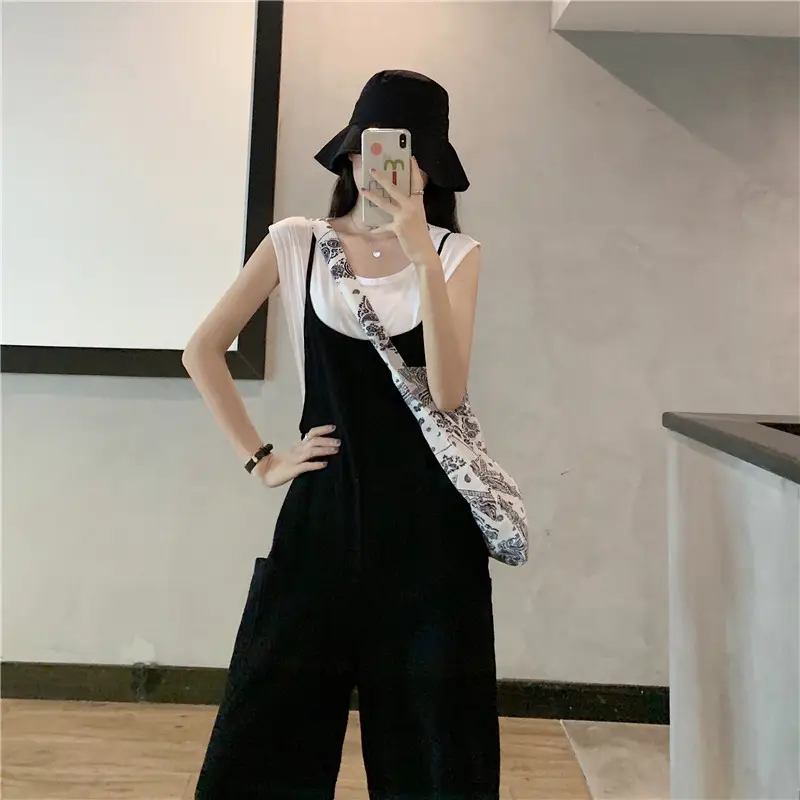 Women's Black Wide Leg Pants with White Top & Bucket Hat — feature 10