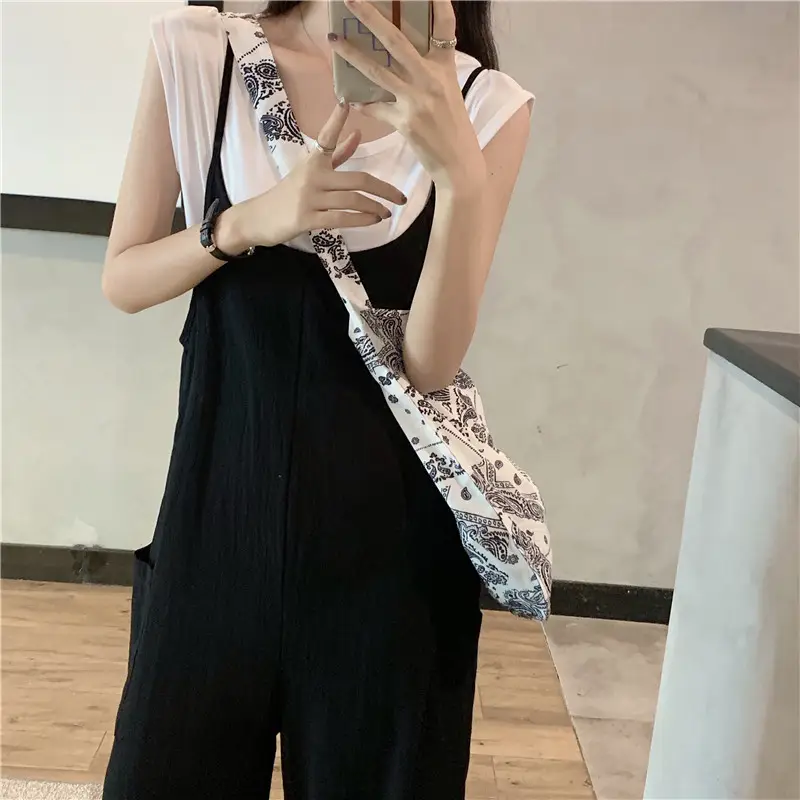 Women's Black Wide Leg Pants with White Top & Bucket Hat — feature 11
