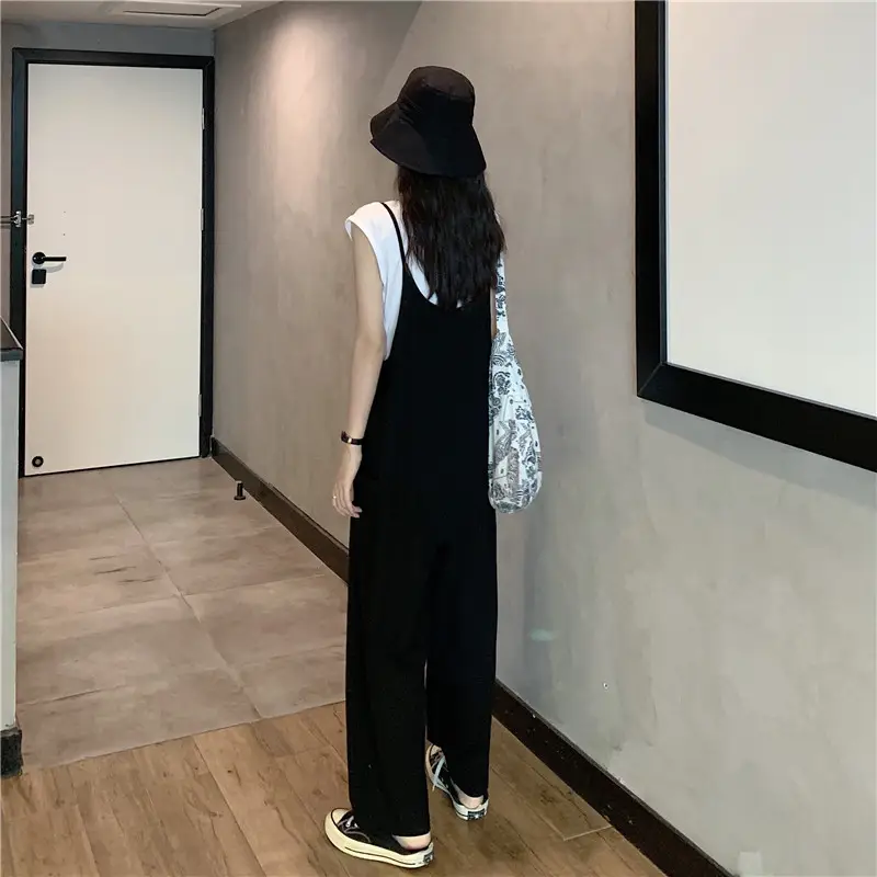 Women's Black Wide Leg Pants with White Top & Bucket Hat — feature 14