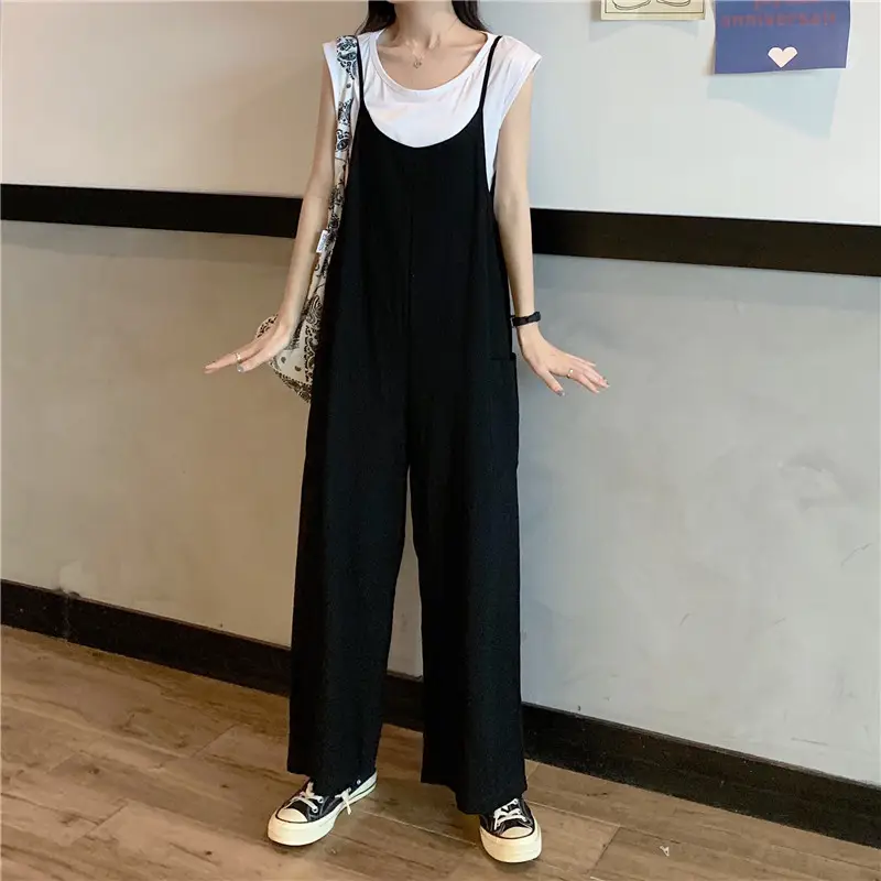 Women's Black Wide Leg Pants with White Top & Bucket Hat — feature 15