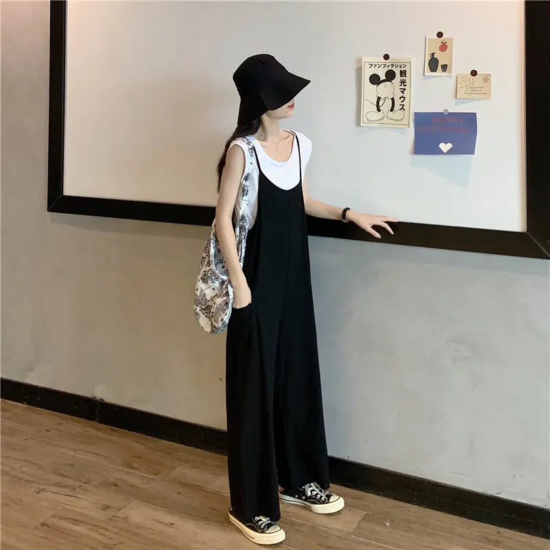 Women's Black Wide Leg Pants with White Top & Bucket Hat — feature 16