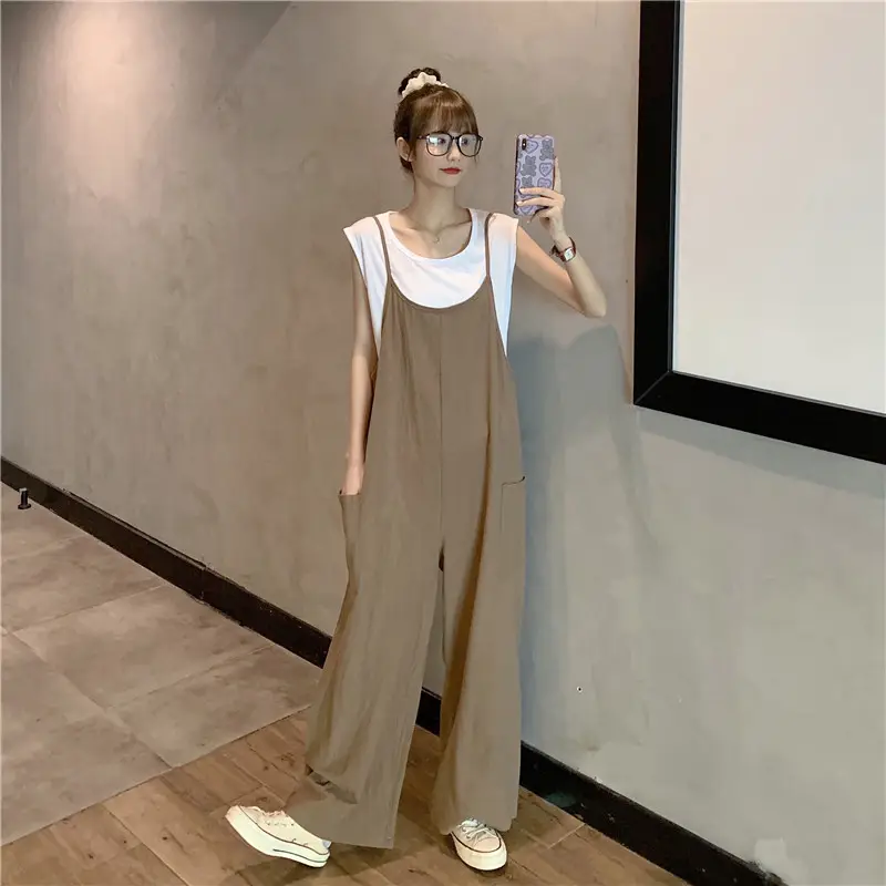 Women's Black Wide Leg Pants with White Top & Bucket Hat — feature 17