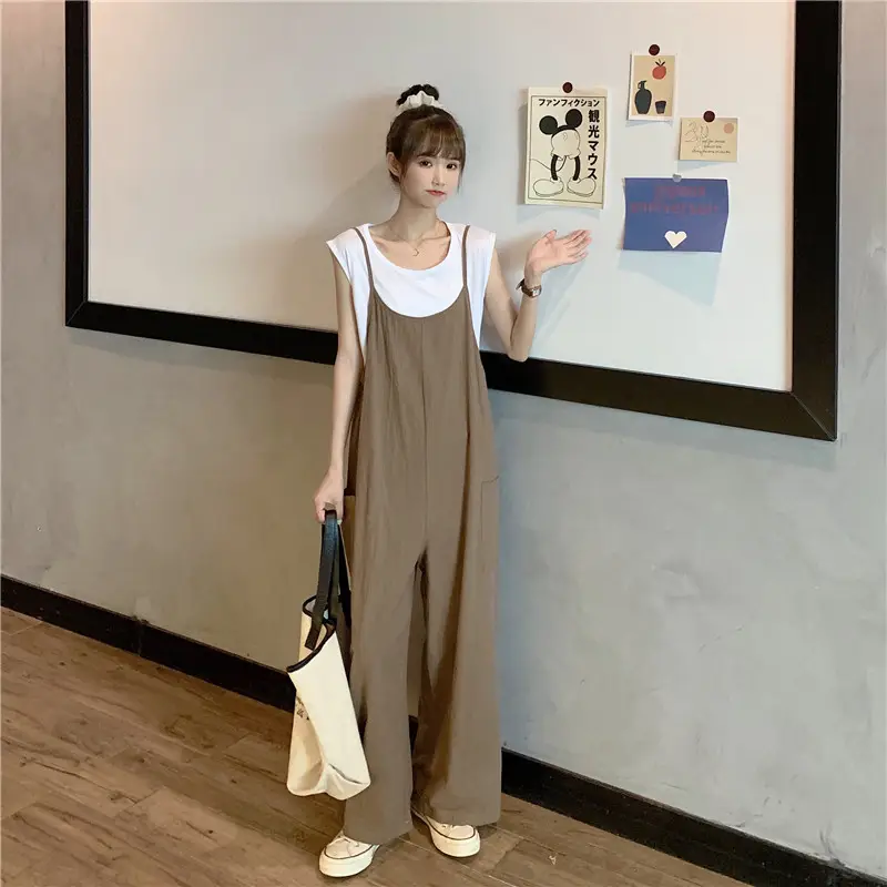 Women's Black Wide Leg Pants with White Top & Bucket Hat — feature 18