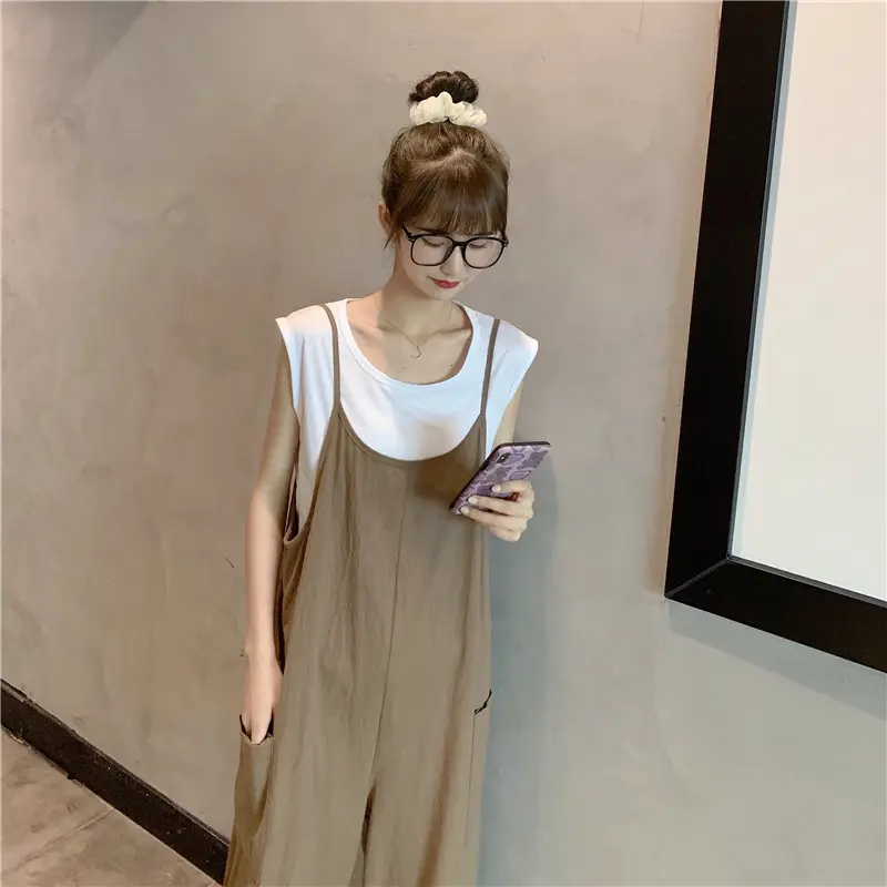 Women's Black Wide Leg Pants with White Top & Bucket Hat — feature 19