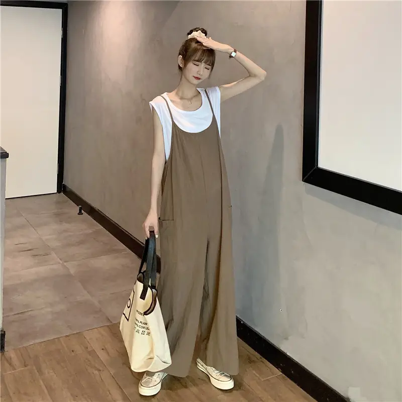 Women's Black Wide Leg Pants with White Top & Bucket Hat — feature 20