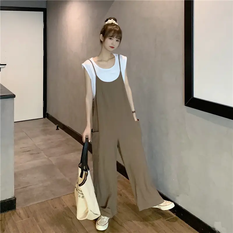Women's Black Wide Leg Pants with White Top & Bucket Hat — feature 21