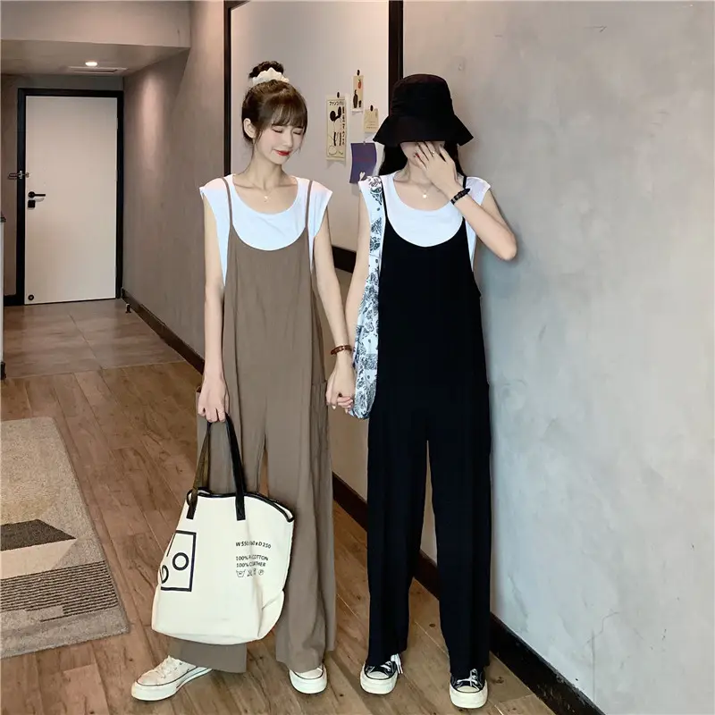 Women's Black Wide Leg Pants with White Top & Bucket Hat — feature 4