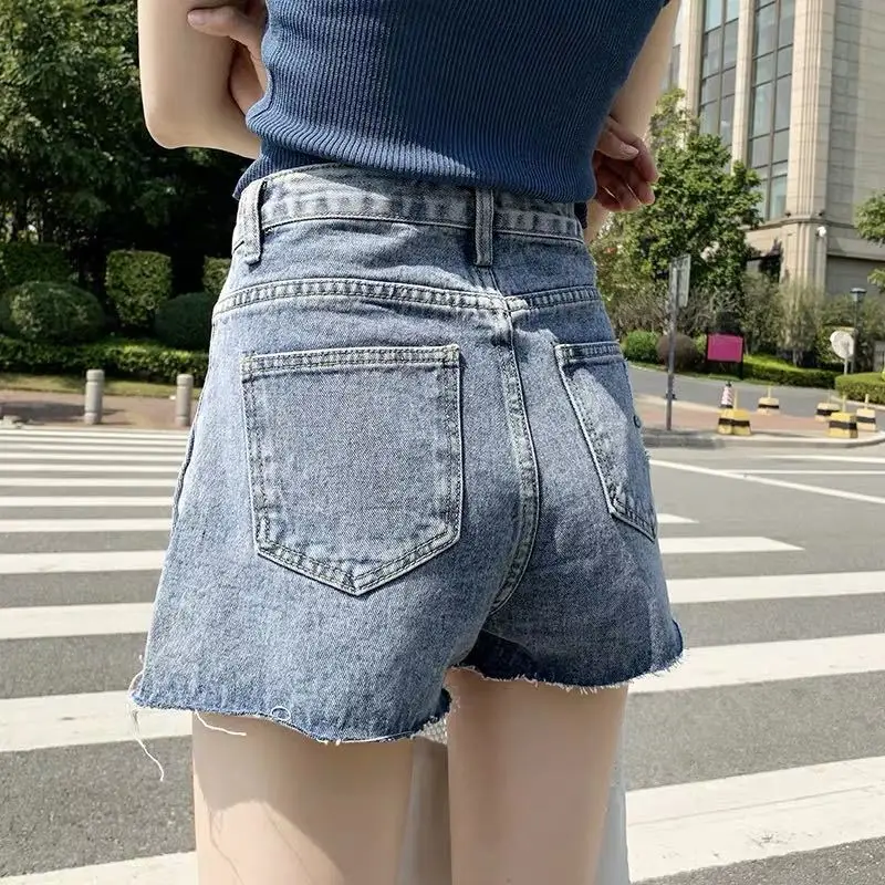 Vintage High-Waisted Ripped Shorts for Women 2022 - Image 16