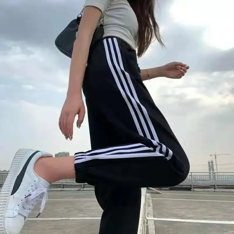 Black Women's Slim Sports Pants with 3 Stripes - Image 2