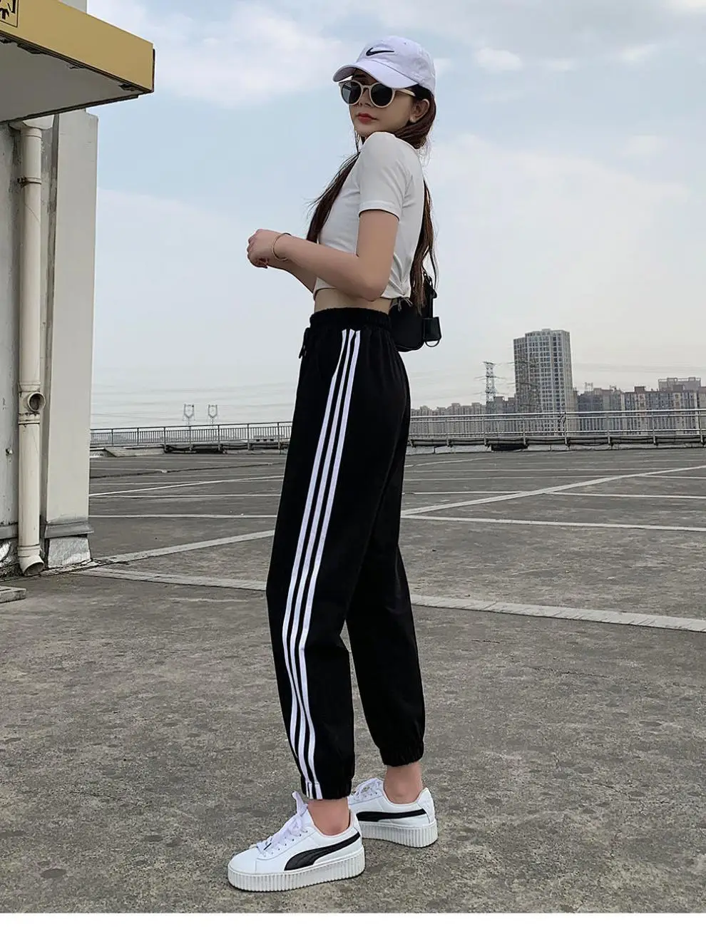 Black Women's Slim Sports Pants with 3 Stripes — feature 9