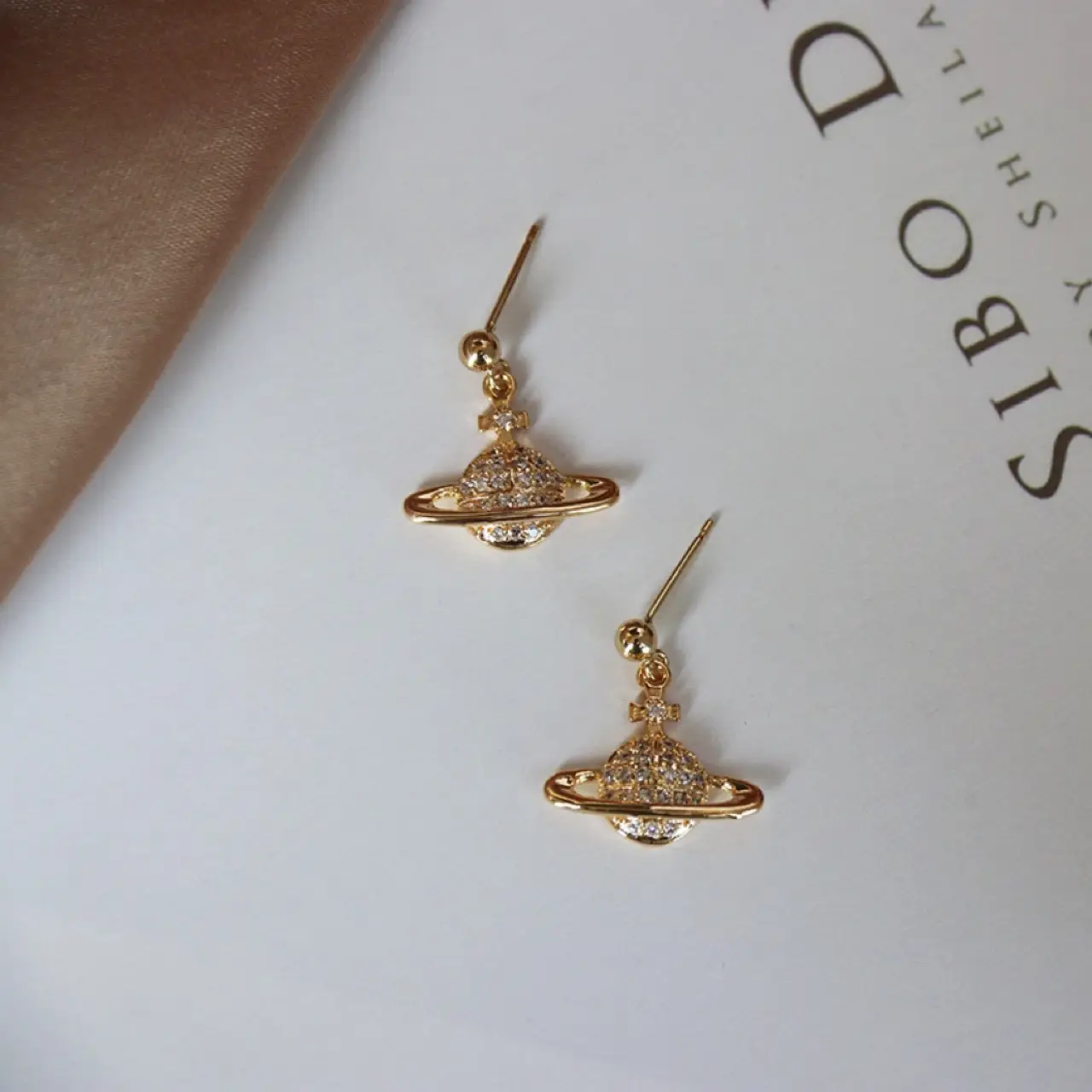 Saturn Controlled Micro Diamond White Zircon Earrings for Women - Image 2
